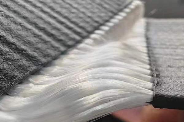 高韧性聚酯纱线集束土工格栅在挡土墙中的应用  第3张